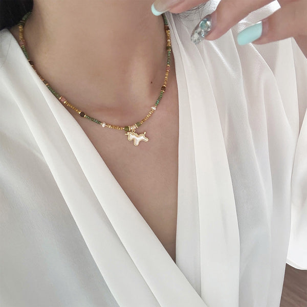 Retro simple shell unicorn stud earrings niche high-end silver needle