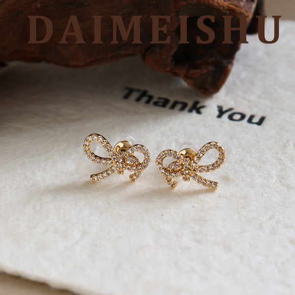 Stylish, simple and elegant, micro-inlaid zircon bow stud earrings, niche high-end silver needles