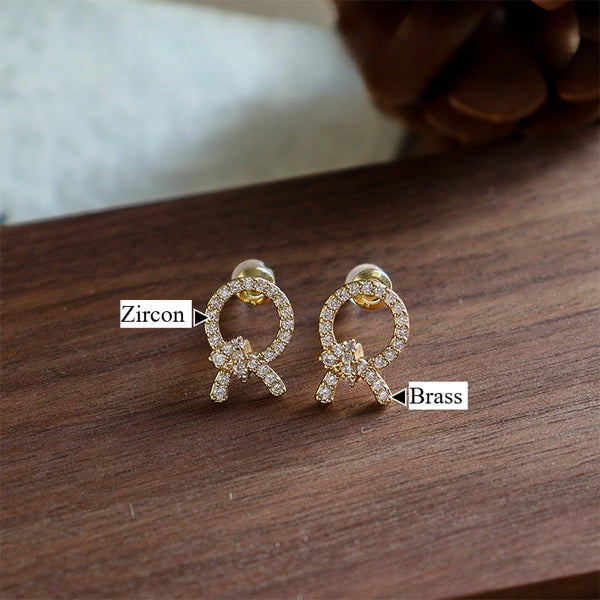 Stylish, simple and exquisite, micro-inlaid zircon bow stud earrings, niche and high-end sense